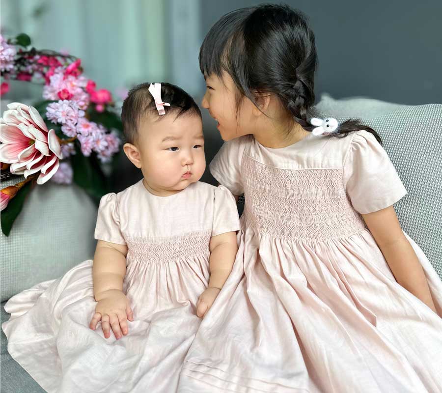 Leona Rosé Smocked Babydoll Dress